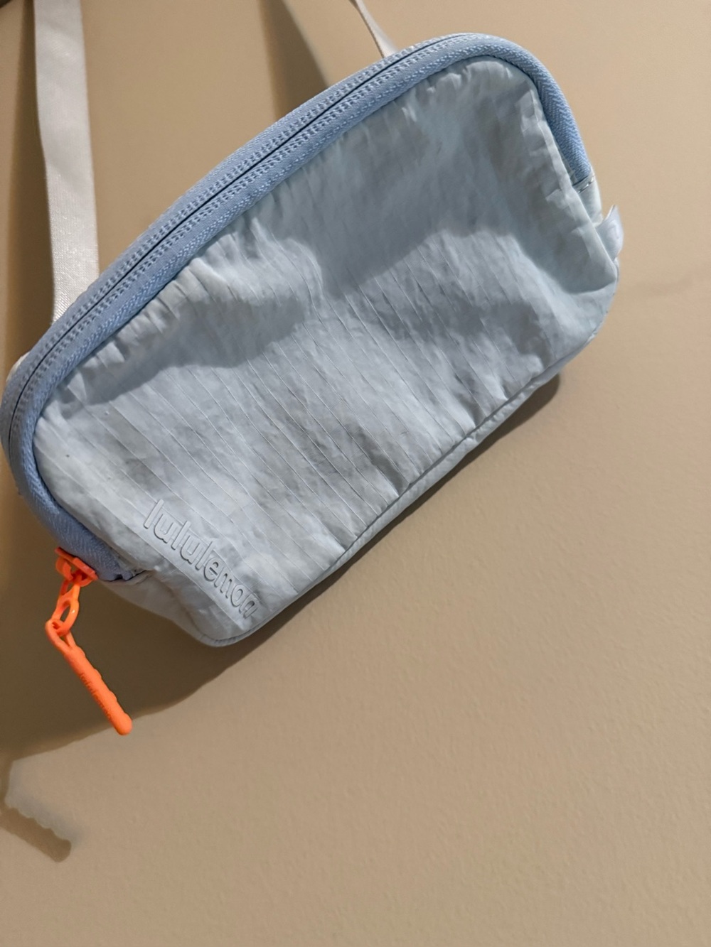 lululemon vapor Light Blue / gray Crossbody Pouch with Orange Zipper Pull